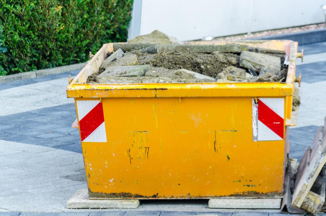 best dumpster rental for construction concrete